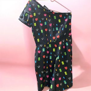 Chic One-Shoulder Jumpsuit with Heart Print