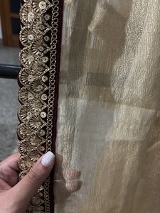 Elegant Golden saree with Embellished Border