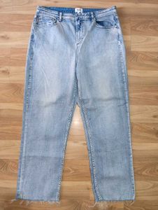 Seed Light Wash Distressed Hem Jeans