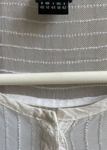 Elegant White Cotton Kurta with Intricate Detailin