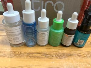 Assorted skincare glass empties