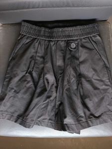 Black Leather Pleated Shorts with Button Detail