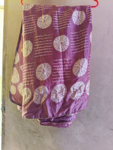 Elegant Purple Saree with Circular Motifs