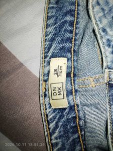 Distressed Blue Denim Jeans