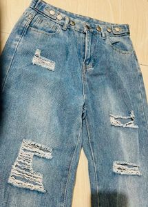 Distressed Blue Denim Jeans