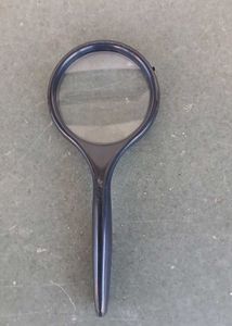 World Globe with Magnifying Glass