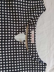 Chic Black and White Gingham Bell Sleeve Top