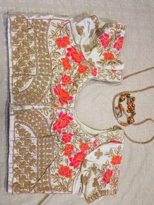 Vibrant Orange Saree with Embellished Border