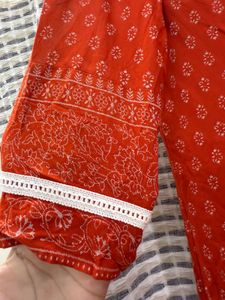 Orange Printed Kurta with Tassel Detail