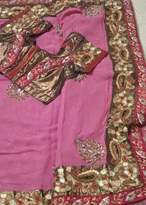 Elegant Pink Saree with Intricate Embellishments