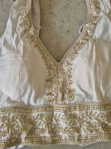 white sequeinned blouse