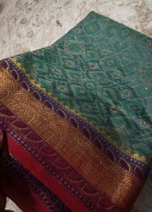 Exquisite Teal Saree with Red Blouse