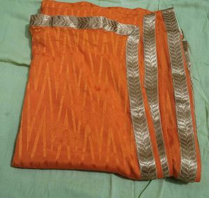 Orange dupatta with Silver Border