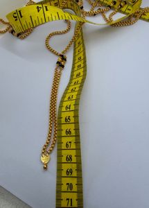 Elegant Gold Chain with Black Beads