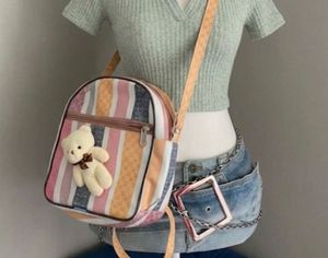 🧸 Striped Backpack with Teddy Bear Charm 🧸