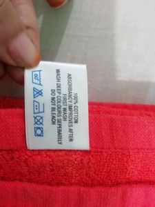 Coral red bath towel