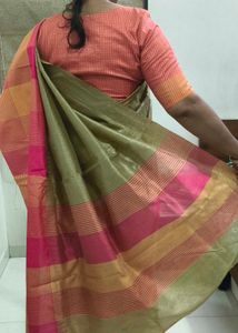 Elegant Gold Saree with detailed pink orange skirt