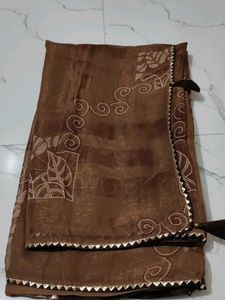 Elegant Brown Saree with Gold Border