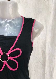Black Sleeveless Top with Pink Flower Design