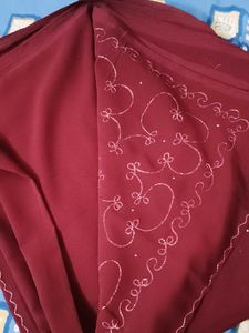 Elegant Maroon Saree with Embellishments