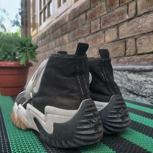 Converse High-Top Sneakers.