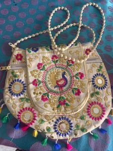 Embroidered Peacock sling Bag