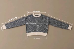 BLACK &amp; CREAM ABSTRACT WAVE KNIT SWEATER