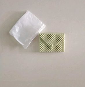 Unique Artificial Beaded Clutch