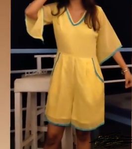 Vibrant Yellow jumpsuit with Teal Trim