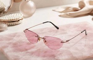 Retro Pink Rimless Sunglasses