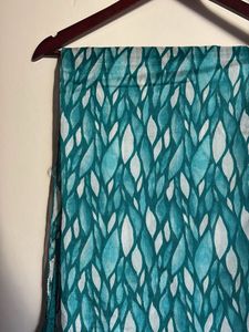 Elegant Teal Saree with Intricate Border