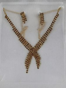 Trending gold jerkin necklace and choker with earr