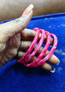 Vibrant Red Bangles with White Swirls