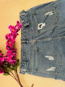 Ripped Blue Jeans