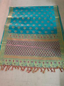 Beautiful Teal Saree with Gold Border