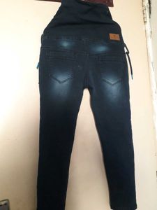 Stylish High-Waisted Jeans with Unique Details