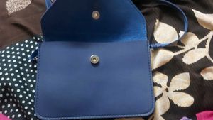Charming Blue Crossbody Bag with Flower Detail