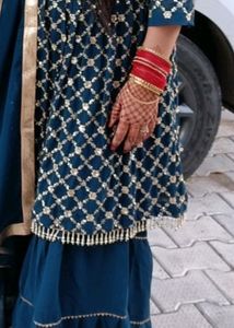 newly sharara suit with embroidery and stars work and also duptta work with lase