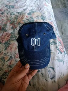 blue denim cap.