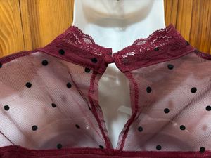 Polka dotted sheer top