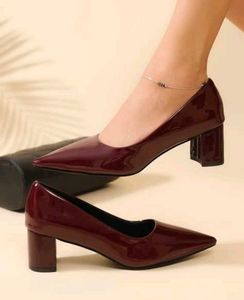 Cherry red pointed Toe pump heels