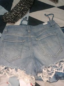 Distressed Denim Shorts with Lace Trim
