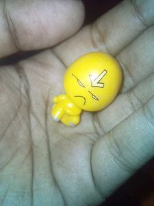Vintage Toy Character with Wheels
