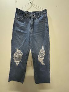 Distressed Blue Denim Jeans