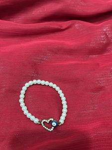 Evil Eye Adjustable Band In White Or Black
