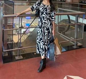 Chic Black & White Leaf Print Maxi Dress