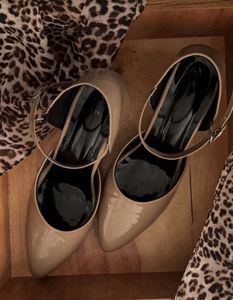 Elegant Nude Patent Heels