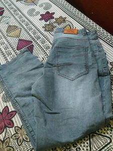 Distressed Blue Denim Jeans