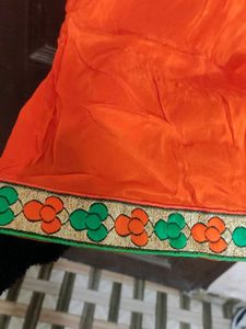 get free green paranda Orange Salwar Kameez