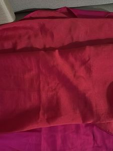 Vibrant Pink crepe Silk Saree with Tassels